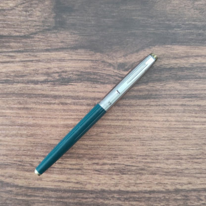 Beautiful Silver Cap on Green Body